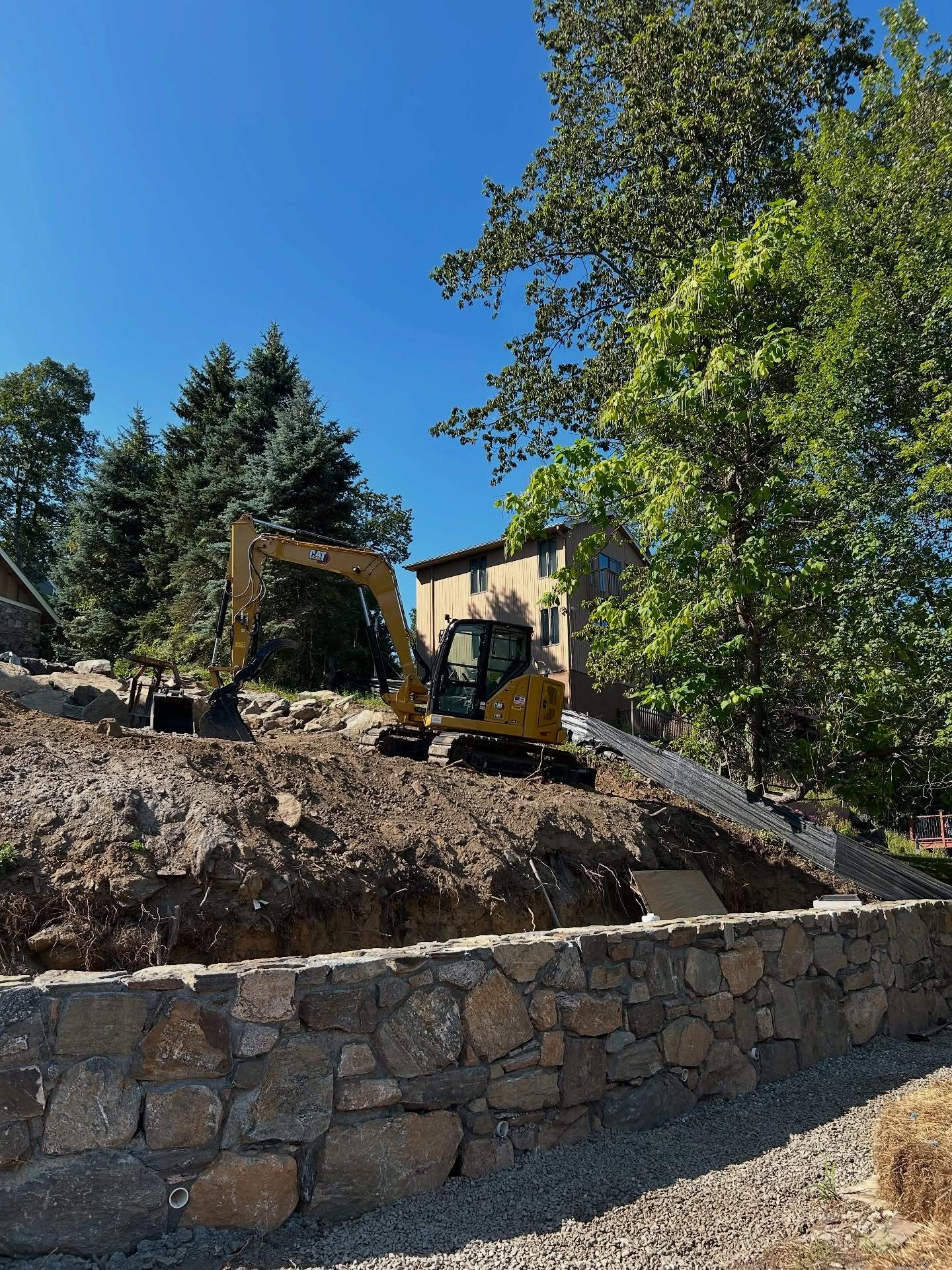 Stone Retaining Walls & Lot Regrading